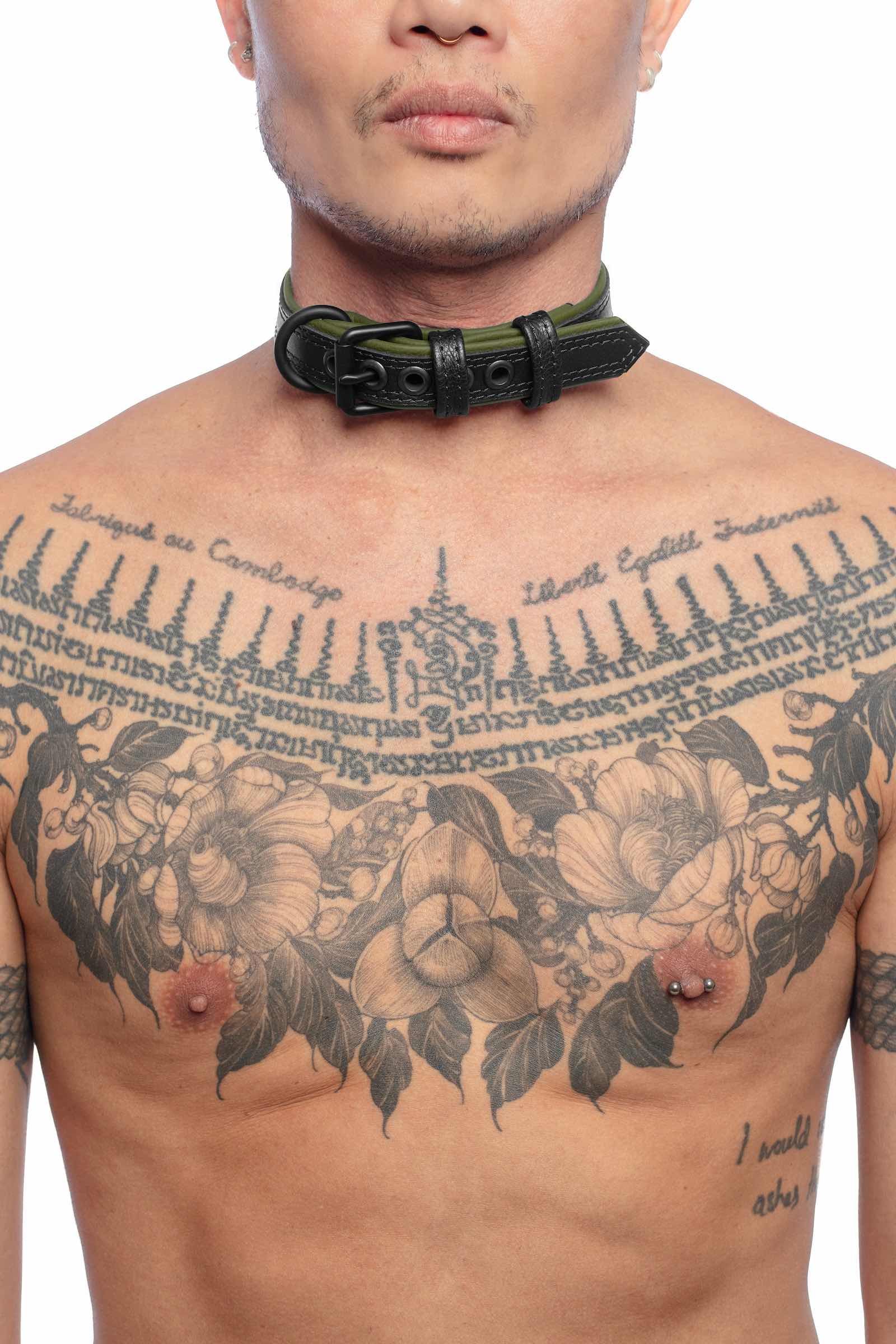 Front-on shot of striking model wearing a 1" wide ARMY OF MEN COMBAT COLLAR NARROW - Army Green with a matte black buckle.