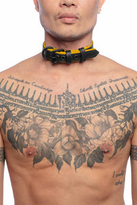 Asian model wearing a 1" wide ARMY OF MEN leather COMBAT COLLAR NARROW - Yellow with a matte black buckle.