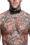 Front view of striking model in a 1.5" wide ARMY OF MEN black and grey leather collar with matte black hardware.