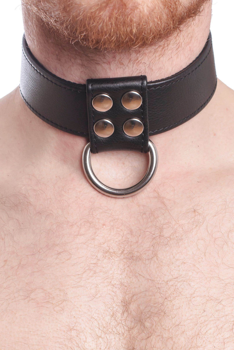 Close view of muscular model in a 1.5" wide ARMY OF MEN black leather collar with stainless steel snaps, rivets, and D-ring.