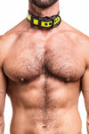 A 1.5" wide ARMY OF MEN black and fluro yellow leather collar with black rivets, buckle, and D-ring, worn by a defined model.