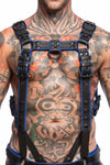 Front view of a toned model wearing a 1.5" wide ARMY OF MEN FULL COMBAT KIT - Blue, connected to a cockring and a jockstrap.