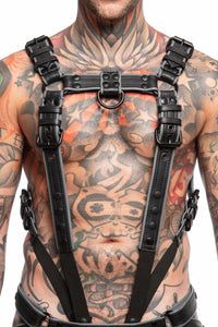 Male model facing forward in a 1.5" wide ARMY OF MEN black and grey leather Full Combat Kit, connected to a cockring.