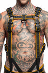 Front-on shot of toned model in a 1.5" wide ARMY OF MEN FULL COMBAT KIT - Yellow, connected to a cockring and a jockstrap.