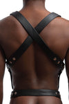 Male model wearing an ARMY OF MEN black leather Full Universal X Kit with stainless steel O-rings, back view.