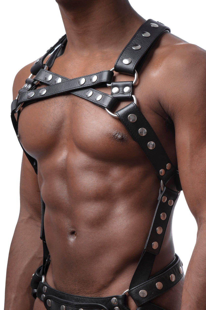 Three-quarter view of model in an ARMY OF MEN Full Universal X Kit with stainless steel hardware. Front straps crossed.