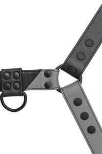 A 1.5" wide ARMY OF MEN CHEVRON BULLDOG - Grey with matte black hardware, laid flat and viewed from above.