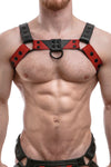 A 1.5" wide ARMY OF MEN CHEVRON BULLDOG - Red with matte black rivets, worn by a chiselled model.