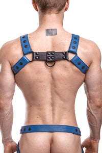 Male model turned away in a 1.5" wide ARMY OF MEN CLASSIC BULLDOG - Blue with matt black rivets, snaps, O-rings, and D-rings.