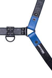 ARMY OF MEN 1.5" wide blue and black leather bulldog harness with matte black rivets, displayed flat and showing the lining.