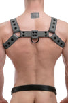 Male model seen from behind wearing a 1.5" wide ARMY OF MEN CLASSIC BULLDOG FULL COLOUR - Grey with matte black snaps.