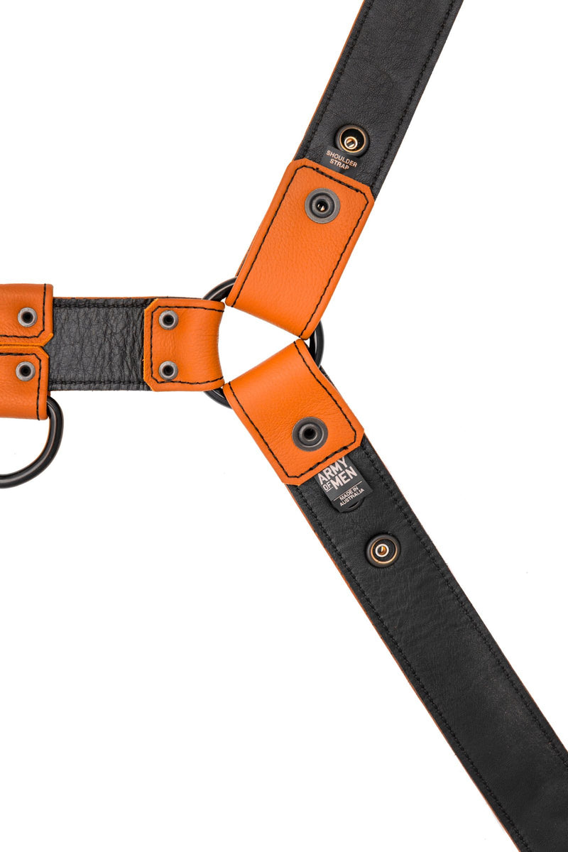 A 1.5" wide ARMY OF MEN CLASSIC BULLDOG FULL COLOUR - Orange with matte black hardware, laid flat and displaying the lining.