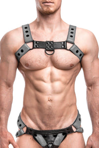 Front view of muscular model in a 1.5" wide ARMY OF MEN CLASSIC BULLDOG - Grey with matte black rivets, snaps, and D-rings.
