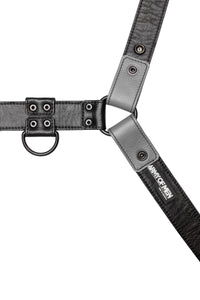 A 1.5" wide ARMY OF MEN grey and black leather harness with matt black hardware, laid flat and displaying the lining leather.