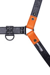 A 1.5" wide ARMY OF MEN CLASSIC BULLDOG - Orange with matte black hardware, laid flat and revealing the lining leather.