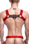 Back view of muscular model wearing a 1.5" wide ARMY OF MEN red and black leather bulldog harness with matte black hardware.