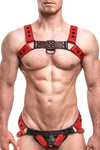 Front-on shot of male model in a 1.5" wide ARMY OF MEN CLASSIC BULLDOG - Red with black rivets, snaps, O-rings, and D-rings.