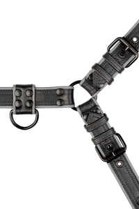 A 1.5" wide ARMY OF MEN COMBAT BULLDOG - Grey with matte black O-rings, laid flat and viewed from above.