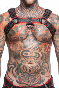 Male model wearing an ARMY OF MEN COMBAT BULLDOG - Red with black rivets, buckles, O-rings, and D-rings, front facing view.