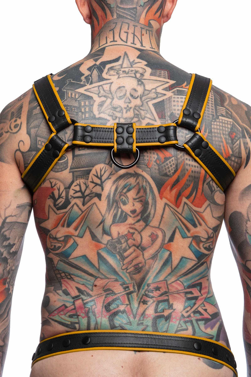 Back view of tattooed model wearing a 1.5" wide ARMY OF MEN COMBAT BULLDOG - Yellow with matte black rivets.