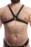 Front view of thick model wearing a 1" wide ARMY OF MEN CLASSIC X HARNESS NARROW - Black with matte black hardware.