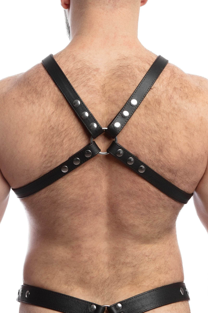 Male model turned away wearing a 1" wide ARMY OF MEN black leather harness with stainless steel snaps, and O-rings.
