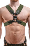 Male model wearing a 2" wide ARMY OF MEN COMMANDER X HARNESS - Army Green with matte black O-rings, front facing view.