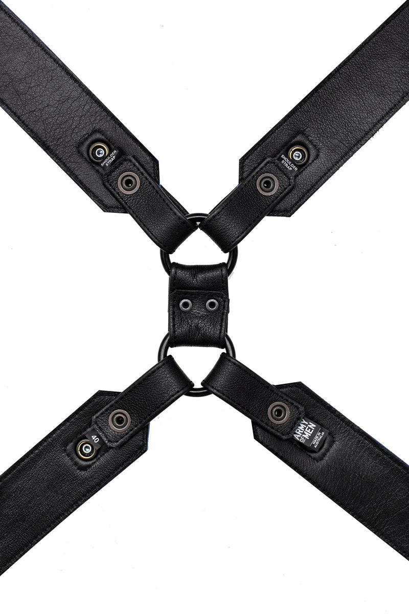 A 2" wide ARMY OF MEN black leather Commander X harness with matte black metal hardware, laid flat and displaying the lining.