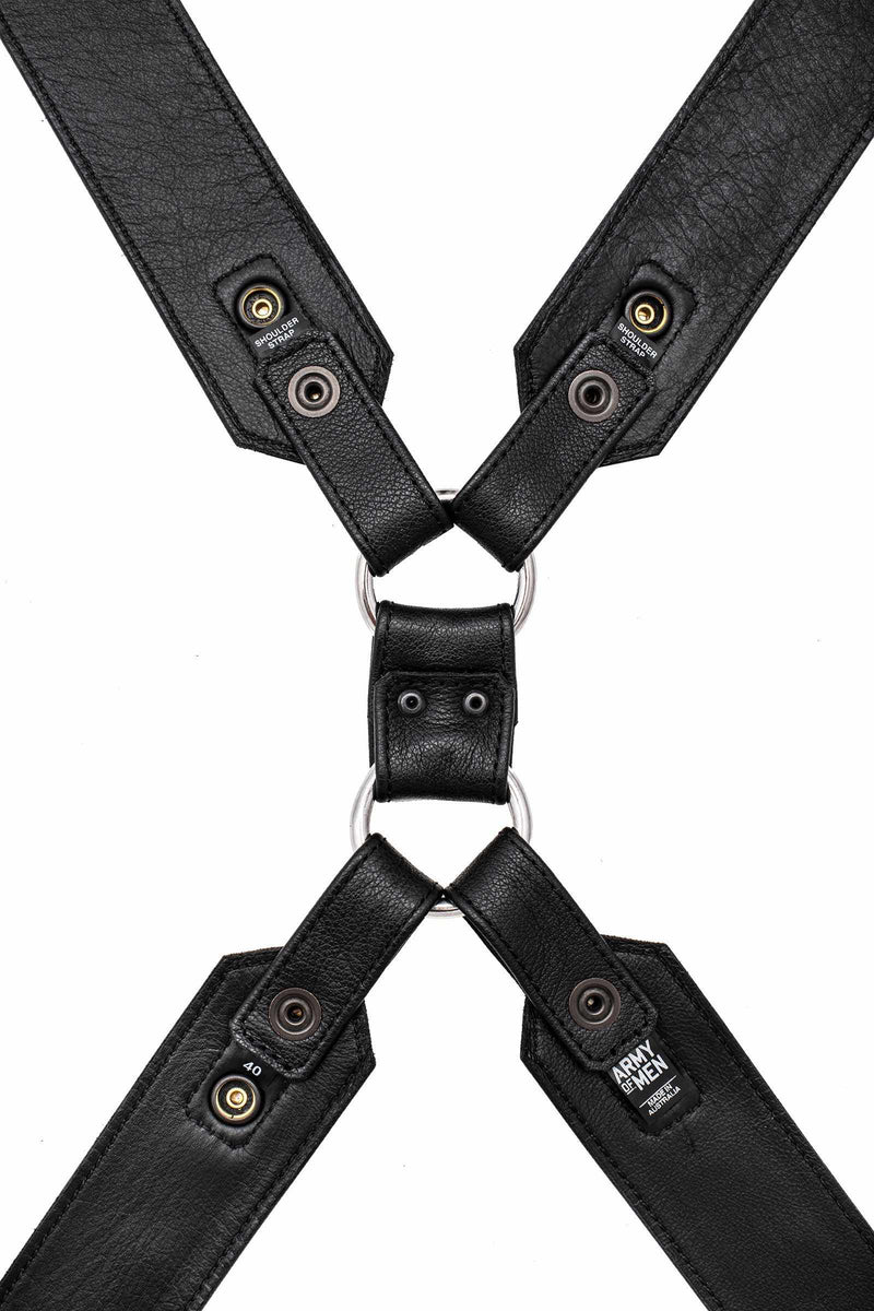 ARMY OF MEN 2" wide black leather Commander X harness with stainless steel O-rings, displayed flat and displaying the lining.