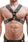 A 2" wide ARMY OF MEN COMMANDER X HARNESS - Grey with matte black rivets, snaps, and O-rings, worn by a chiselled model.