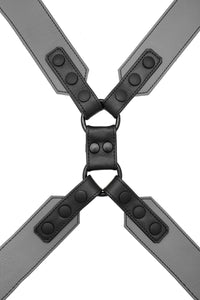 A 2" wide ARMY OF MEN COMMANDER X HARNESS - Grey with matte black snaps, laid flat and viewed from above.