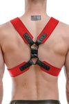 A ginger haired model turned away wearing an ARMY OF MEN red and black leather Commander X harness with matte black hardware.