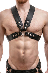 A 2" wide ARMY OF MEN SERGEANT X HARNESS - Stainless Steel with stainless steel snaps, and O-rings, worn by a male model.