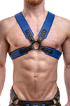 Male model facing forward wearing a 2" wide ARMY OF MEN blue and black leather chest harness with black snaps, and O-rings.