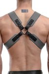 A muscular model turned away in a 2" wide ARMY OF MEN SERGEANT X HARNESS - Grey with matte black snaps, and O-rings.