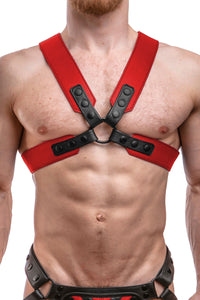 A muscular model in a 2" wide ARMY OF MEN SERGEANT X HARNESS - Red with matte black hardware, front facing view.