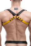 Back shot of male model wearing a 1" wide ARMY OF MEN yellow and black leather shoulder harness with matte black hardware.