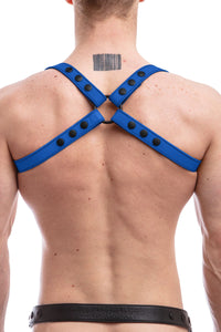 A ginger haired model in a 1" wide ARMY OF MEN SHOULDER HARNESS - Blue with matte black O-ring, back view.