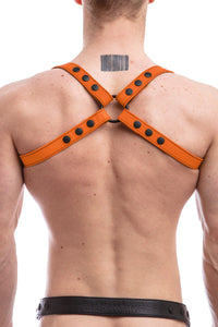 Male model turned away wearing a 1" wide ARMY OF MEN SHOULDER HARNESS - Orange with matte black snaps, and O-ring.
