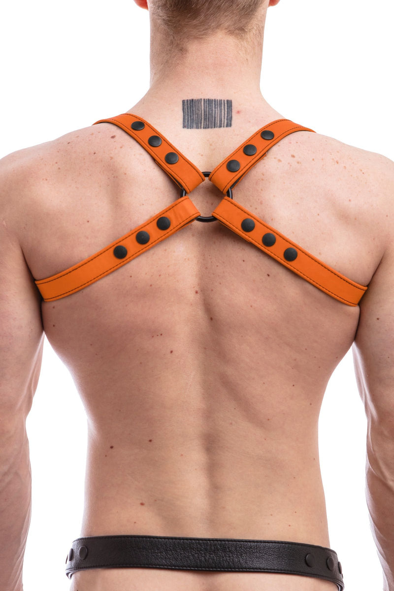 Male model turned away wearing a 1" wide ARMY OF MEN SHOULDER HARNESS - Orange with matte black snaps, and O-ring.