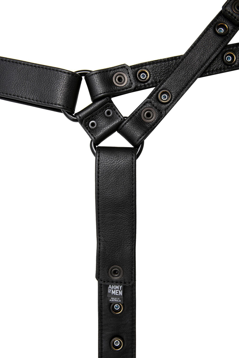 ARMY OF MEN  UNIVERSAL X HARNESS - Black with matte black hardware, laid flat and displaying the lining leather.