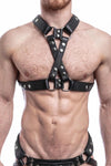 ARMY OF MEN black leather chest harness with stainless steel rivets styled on a male model, facing forward.