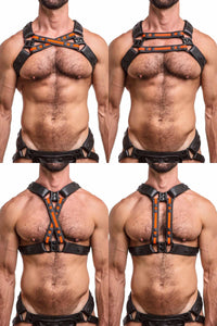 A fit model wearing an ARMY OF MEN black and fluro orange leather X harness with matte black snaps, four ways.