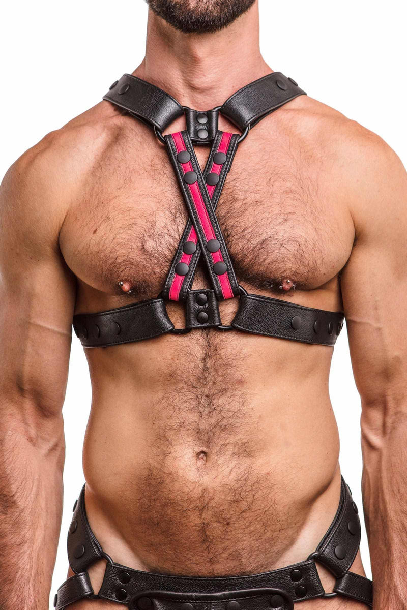 Front-on shot of male model in an ARMY OF MEN UNIVERSAL X HARNESS - Fluro Pink with matte black hardware.