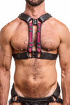 Male model in an ARMY OF MEN black and fluro pink leather chest harness with matte black metal hardware, front facing view.