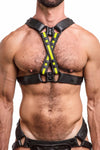Front-on shot of defined model wearing an ARMY OF MEN black and fluro yellow leather X harness with black hardware.