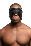 Front-on shot of a muscular Black model wearing an ARMY OF MEN HEAD HARNESS PARTIAL BLINDER with stainless steel hardware.