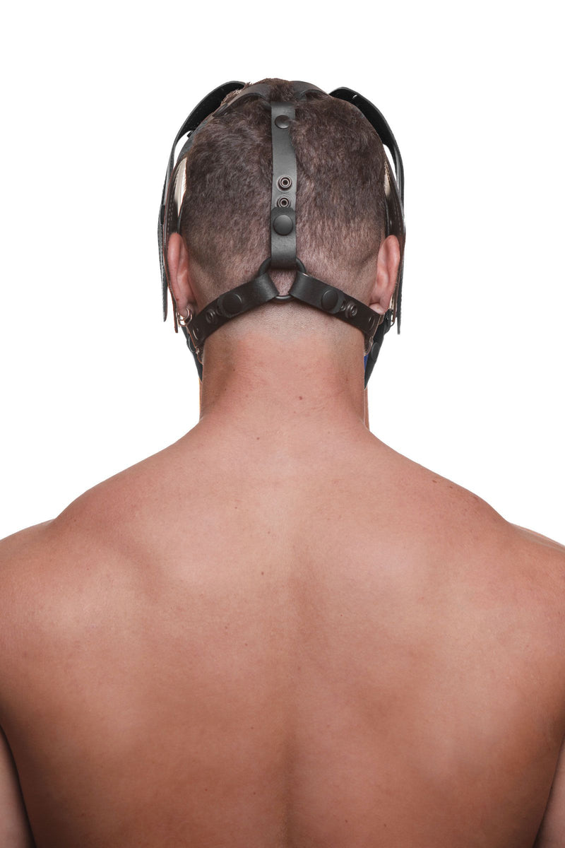 The back view of a male model in an ARMY OF MEN pup hood, featuring hard-wearing matte black metal O-rings, rivets and snaps.