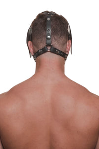 The rear view of a male model wearing an ARMY OF MEN RANGER pup hood, with durable stainless steel rings and snaps caps.