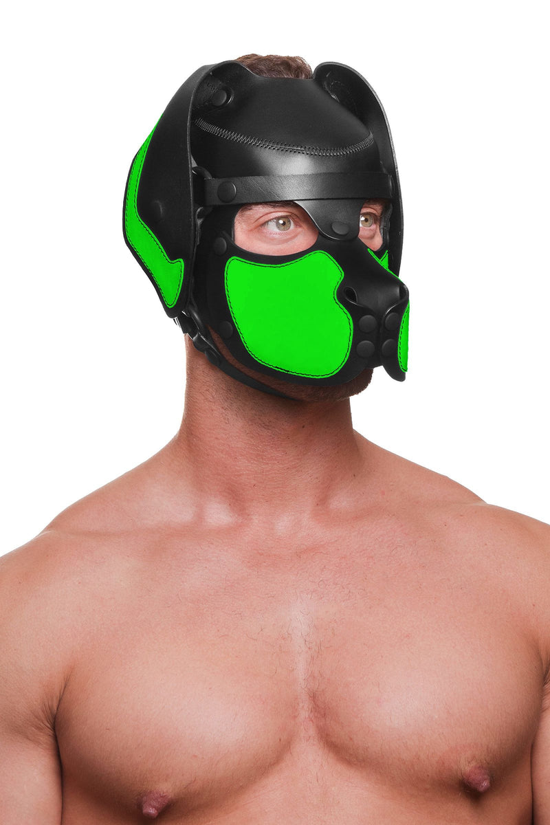Male model posing in a handmade ARMY OF MEN leather RANGER pup hood, with vibrant fluorescent green ears and snout.